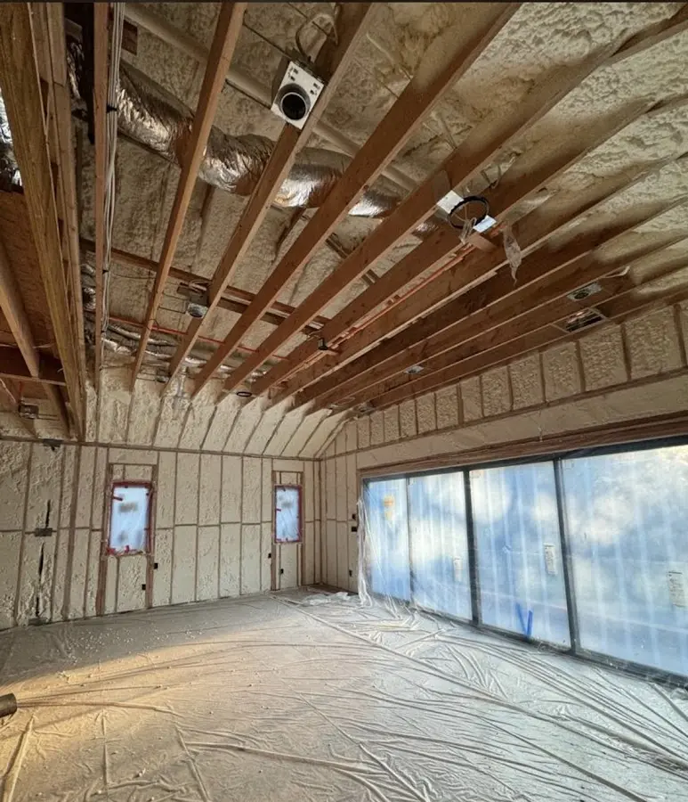 Interior walls and ceiling insulated with spray foam during new construction in Holly Hill